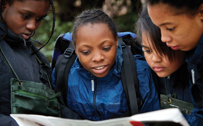 Young girls map reading 800x500